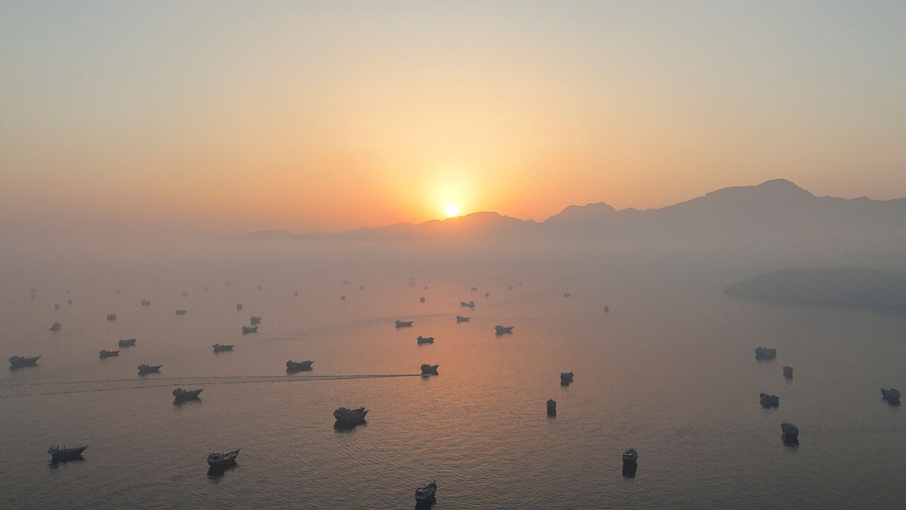 FILE PHOTO: A drone view shows vessels in the Strait of Hormuz, as seen from Musandam, Oman, June 15, 2026. REUTERS/Stringer/File Photo