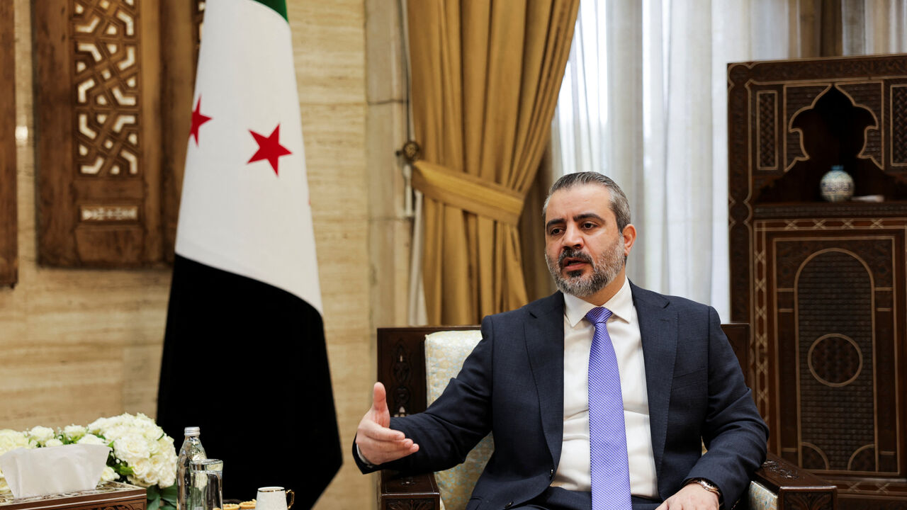 Syrian Foreign Minister Asaad al-Shaibani, speaks during an interview with Reuters in Damascus, Syria, August 22, 2026. REUTERS/Khalil Ashawi