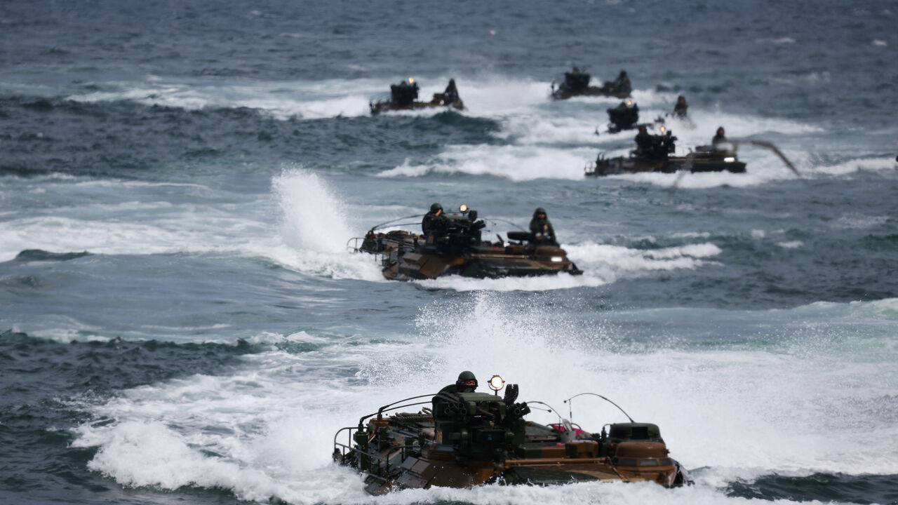South Korean Marines' Assault Amphibious Vehicles (KAAV) make their way through waves during U.S., and South Korea's marine corps combined amphibious landing drill called the 'Ssangyong' exercise, in Pohang, South Korea, September 2, 2024. REUTERS/Kim Hong-Ji/File Photo