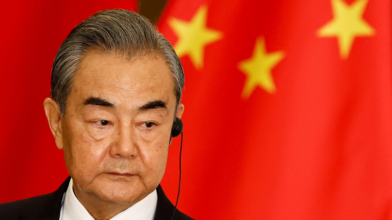 FILE PHOTO: Chinese Foreign Minister Wang Yi listens during a joint press conference with Indonesian Foreign Minister Retno Marsudi (not pictured) following their bilateral meeting in Jakarta, Indonesia, April 18, 2024. REUTERS/Willy Kurniawan/File Photo