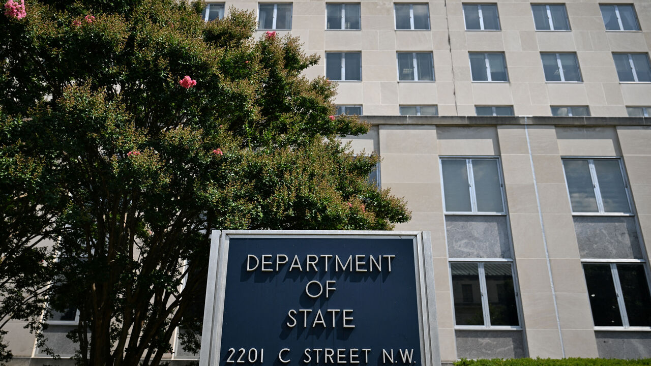 FILE PHOTO: A general view of a U.S. State Department sign outside the U.S. State Department building in Washington, D.C., U.S., July 11, 2025. REUTERS/Annabelle Gordon/File Photo