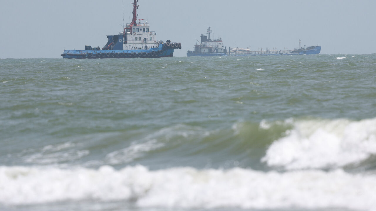Vessels in the Strait of Hormuz are visible near the beach of Bandar Abbas, Iran, August 25, 2026. Majid Asgaripour/WANA (West Asia News Agency) via REUTERS