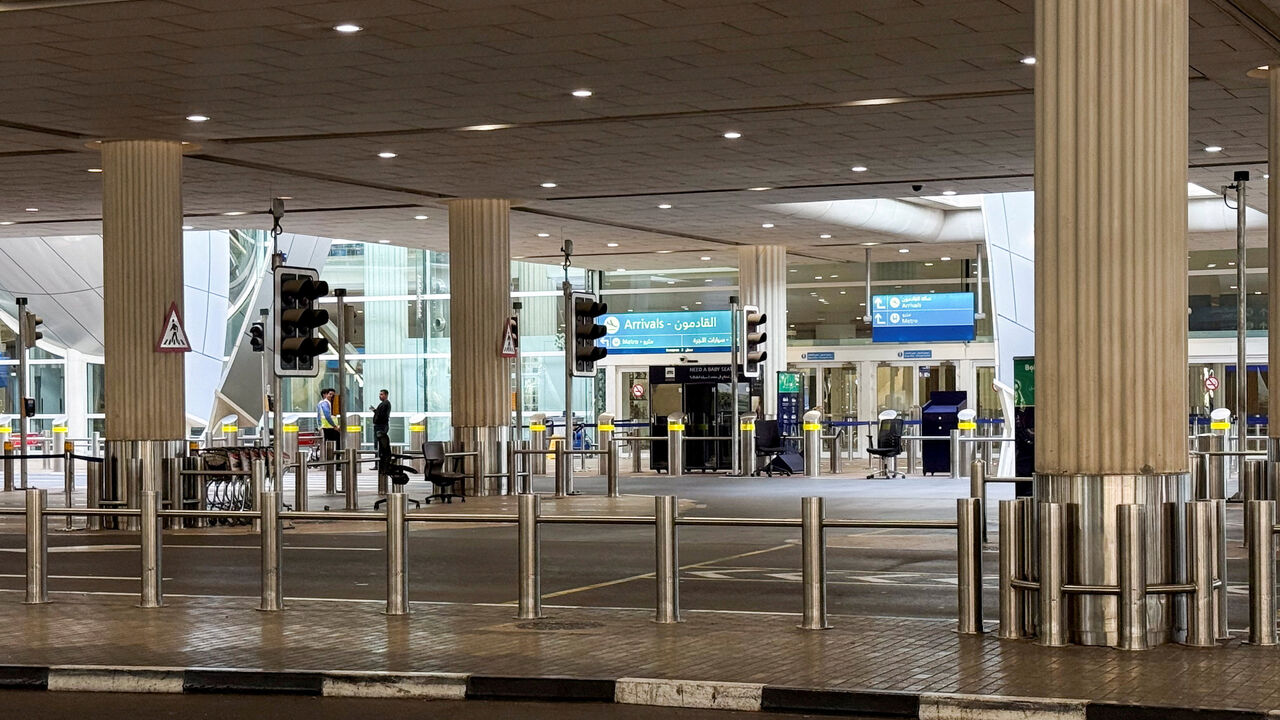 FILE PHOTO: An empty arrivals area at the Dubai International Airport in Dubai, United Arab Emirates, March 2, 2026. Picture taken using a mobile phone. REUTERS/Raghed Waked/File Photo