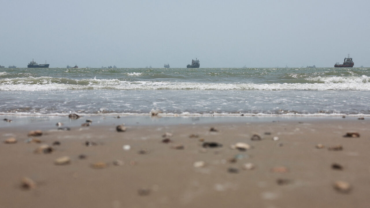 Vessels in the Strait of Hormuz are visible near the beach of Bandar Abbas, Iran, August 25, 2026. Majid Asgaripour/WANA (West Asia News Agency) via REUTERS