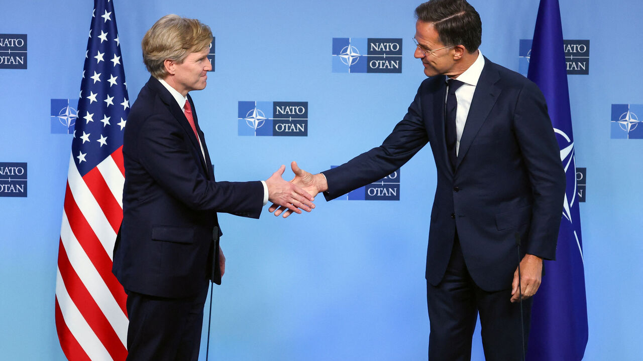 Pentagon policy chief Elbridge Colby shakes hands with NATO Secretary General Mark Rutte, at the Alliance's headquarters in Brussels, Belgium, August 27, 2026. REUTERS/Yves Herman