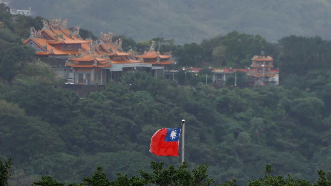 FILE PHOTO: A Taiwan flag flutters in Keelung, as China conducts "Justice Mission 2025" military drills around Taiwan, in Keelung, Taiwan, December 30, 2025. REUTERS/Ann Wang/File Photo