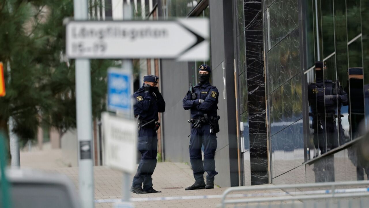 Police outside the offices of an Israeli military technology firm in Gothenburg where shots were fired in October 2024