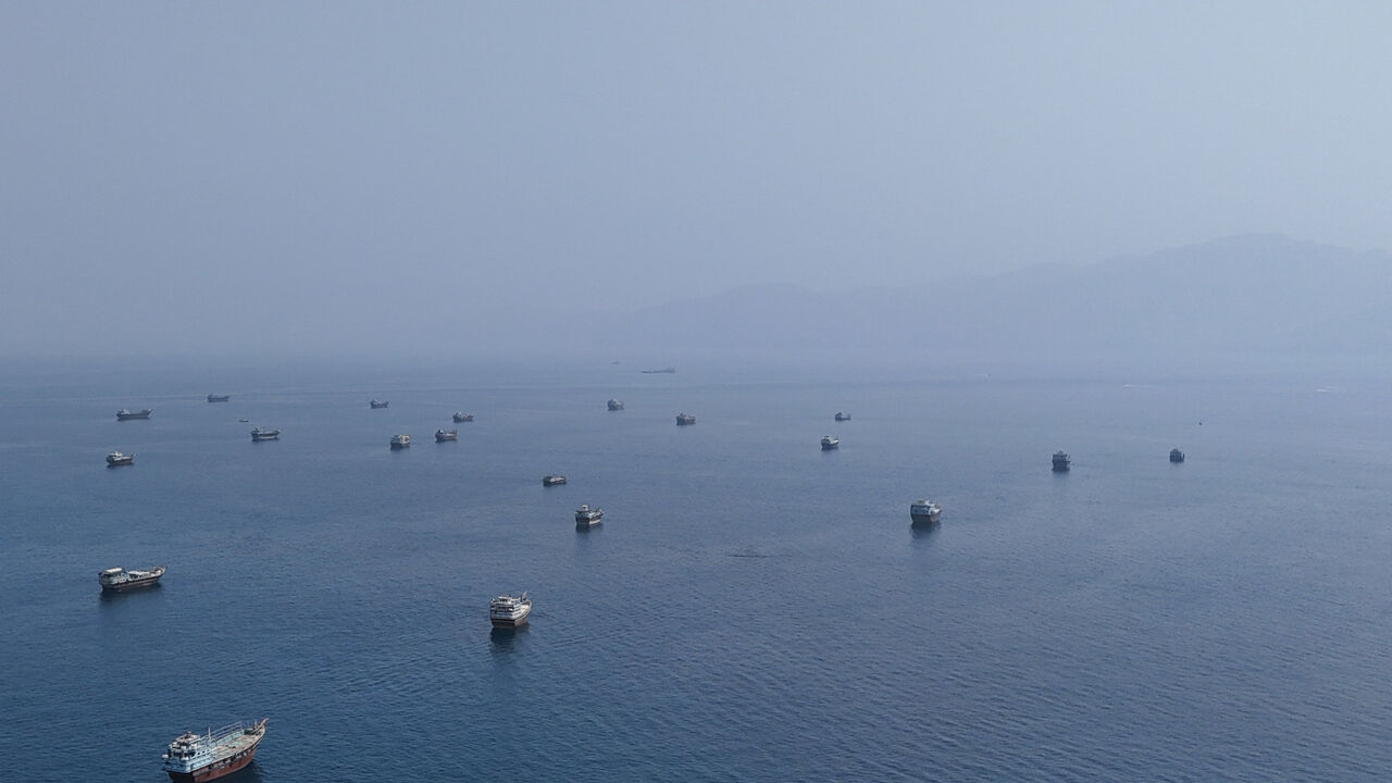 FILE PHOTO: A drone view shows vessels near the Strait of Hormuz, as seen from Musandam, Oman, August 28, 2026. REUTERS/Stringer/File Photo