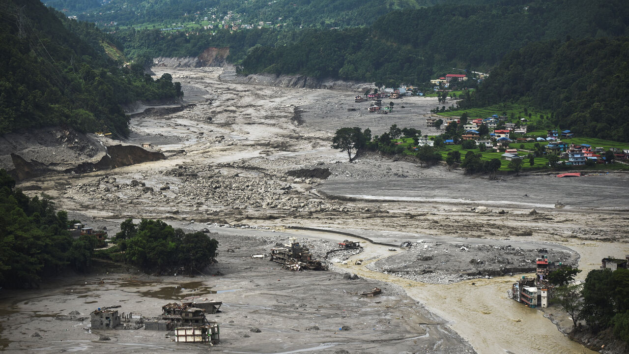 An arial view shows uildings near Trishuli River damaged and covered in mud following deadly flash floods and a mudslide, in Betrawati Bazaar in Rasuwa district, Nepal, August 30, 2026. REUTERS/Stringer