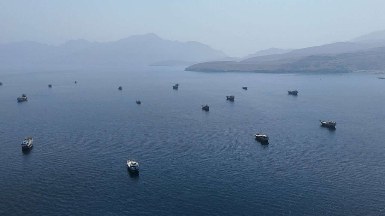 FILE PHOTO: A drone view shows vessels near the Strait of Hormuz, as seen from Musandam, Oman, August 28, 2026. REUTERS/Stringer/File Photo