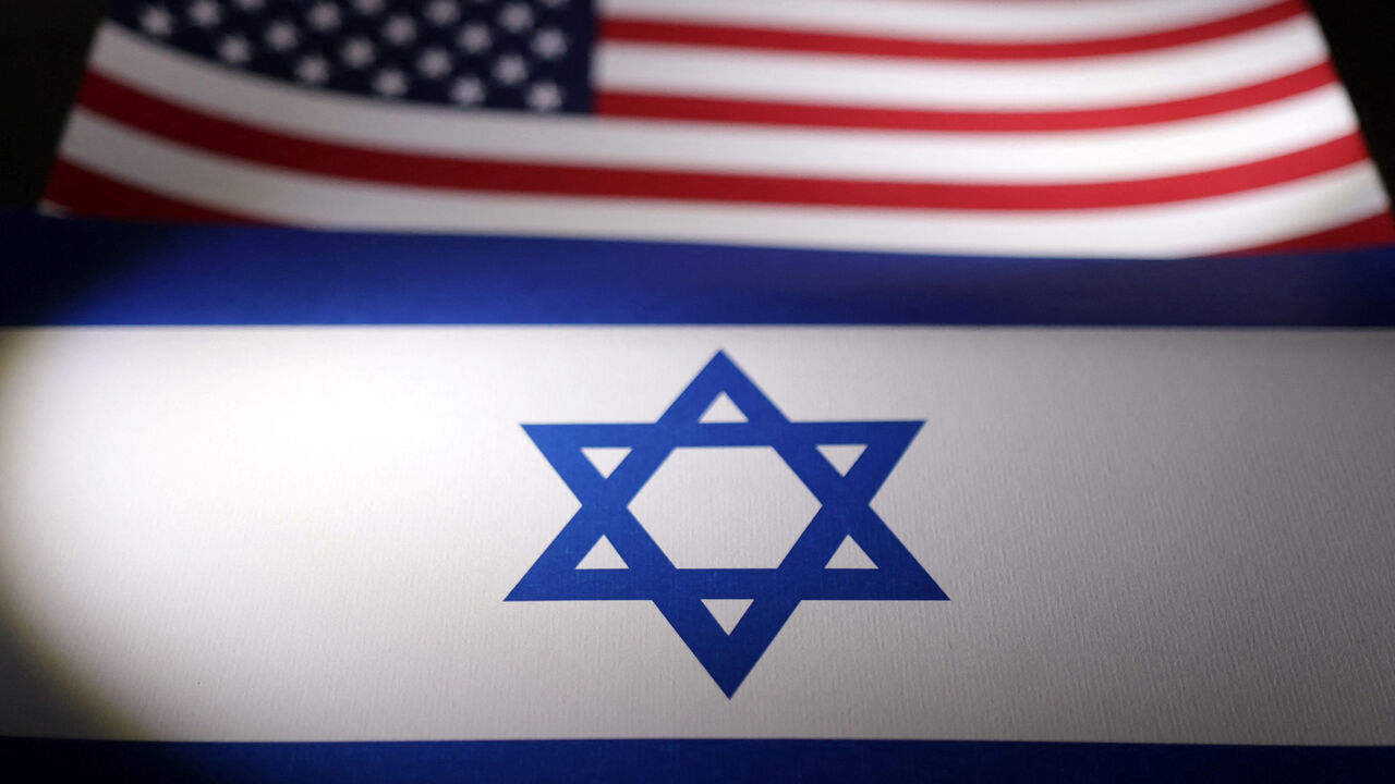 Israeli and U.S. flags are seen in this illustration taken, April 24, 2024. REUTERS/Dado Ruvic/Illustration
