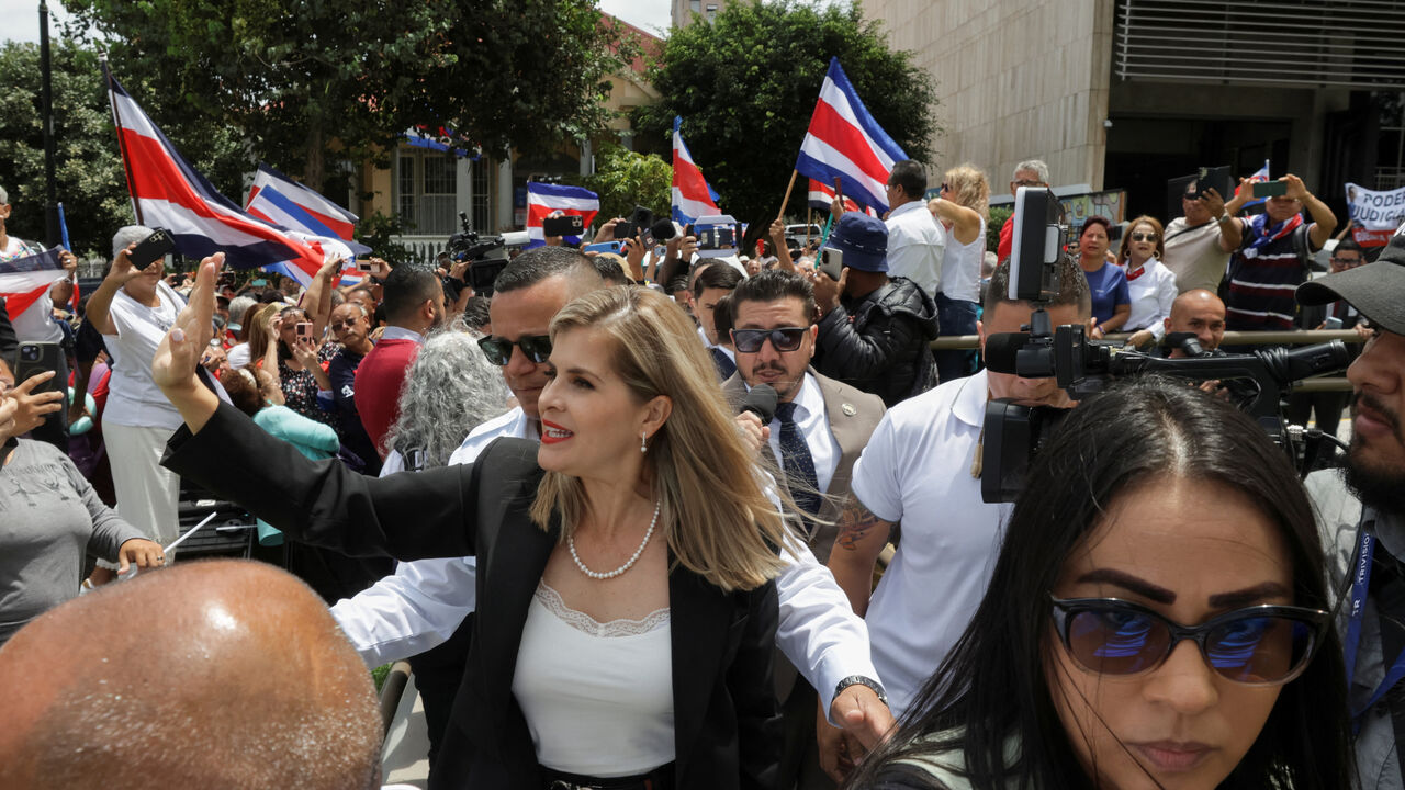Costa Rican President Laura Fernandez and pro-government lawmakers arrive to file a complaint against four Constitutional Chamber justices, alleging judicial misconduct after a ruling they denounced as a "coup d'état," in San Jose, Costa Rica, August 3, 2026. REUTERS/Mayela Lopez