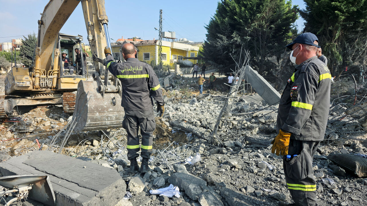 Civil defense personnel operate at the site of an Israeli strike, in Kfar Rumman, Lebanon, September 7, 2026. Picture taken with a mobile phone. REUTERS/Stringer
