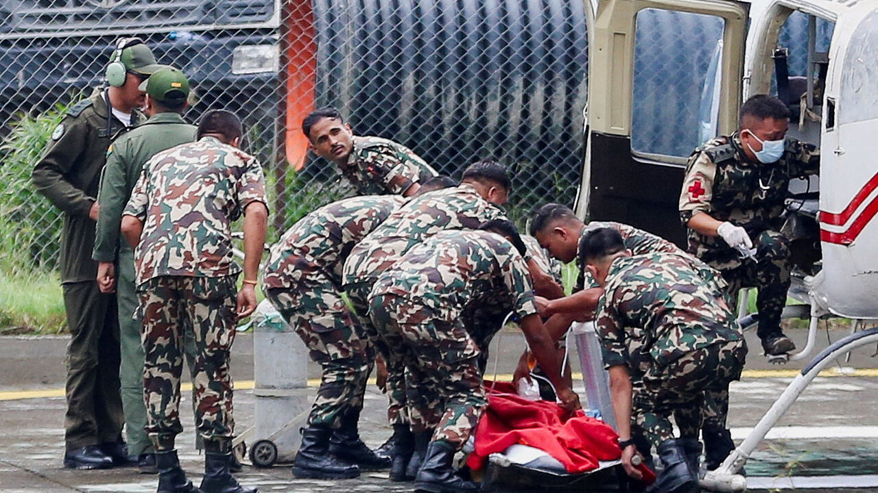 Members of the Nepal Army move a survivor, Kabir Maharjan, rescued from a tunnel at the Upper Trishuli 3A hydropower project, nine days after deadly flash floods and a mudslide, after he was airlifted from an army base in Nuwakot to Kathmandu, Nepal, September 4, 2026. REUTERS/Dipen Shrestha