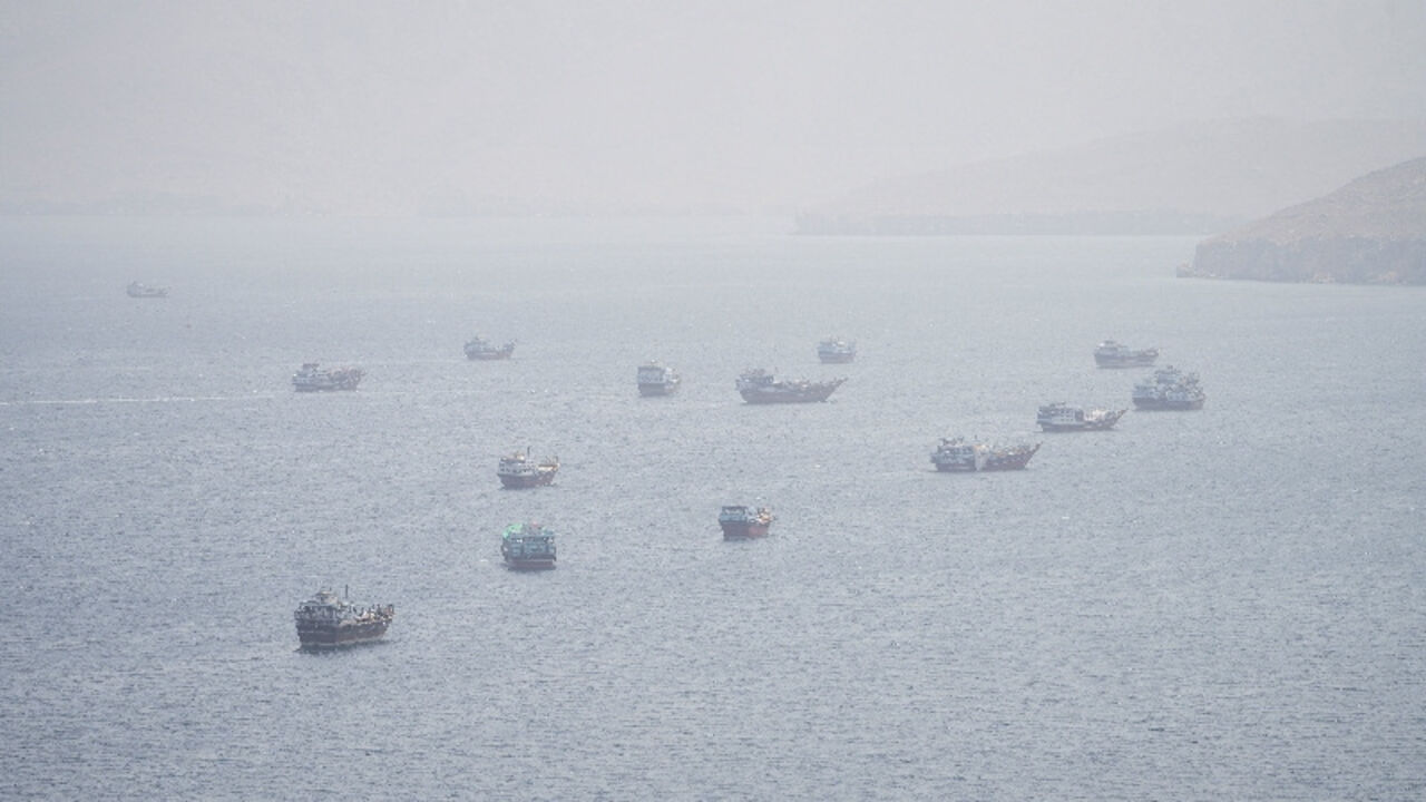 FILE PHOTO: Vessels near the Strait of Hormuz, as seen from Musandam