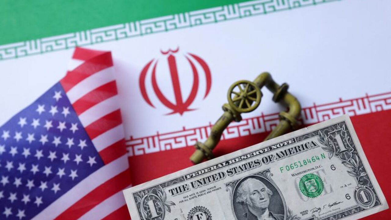 Illustration shows model of natural gas pipeline, U.S. and Iran flags and Dollar banknotes