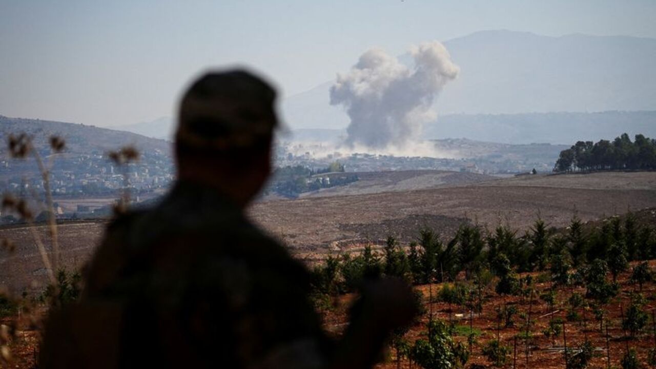 FILE PHOTO: Smoke rises in southern Lebanon following an Israeli strike, as seen from Zawtar al-Gharbiyeh