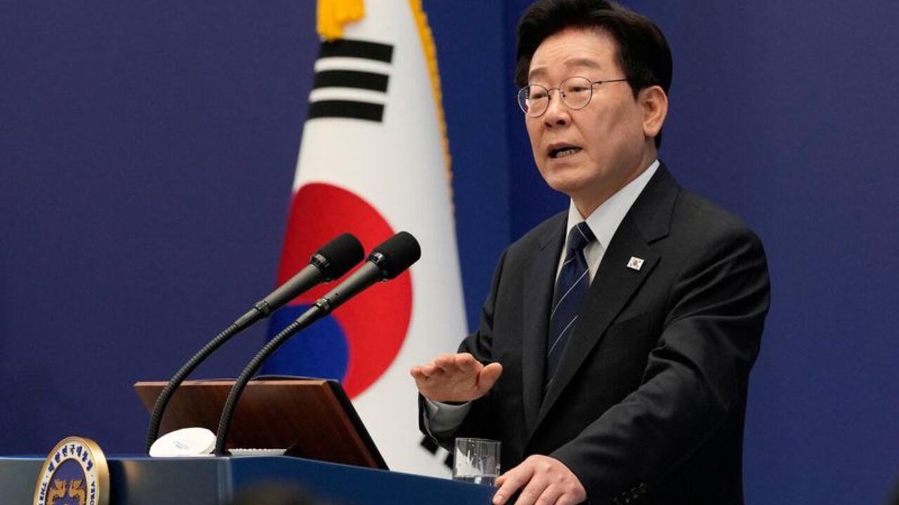 South Korean President Lee Jae Myung speaks during a press conference at the presidential Blue House in Seoul