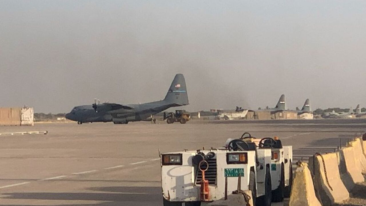 A US military transport aircraft stands at Camp Victory near Baghdad International Airport in Baghdad