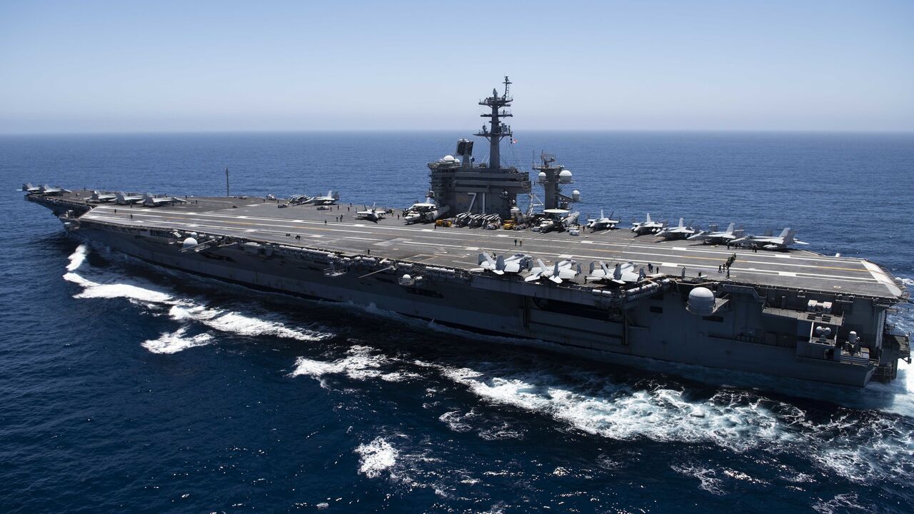 In this handout released by the US Navy on July 15, 2010, the aircraft carrier USS Theodore Roosevelt (CVN 71) transits the Pacific Ocean. 