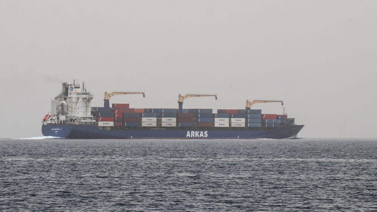 A commercial vessel passes through an international shipping lane off Yemen's Hanish Island in the Red Sea on July 27, 2026. 
