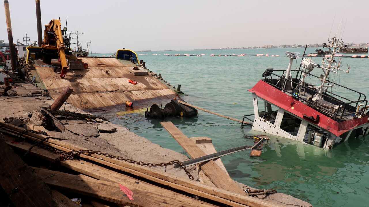 The navigation bridge of a sunken vessel is all that is seen at the surface of the water in the Port of Mocha the day after an attack by the Houthis on the city Mocha, held by Yemen's internationally recognized, Aden-based government, on Aug. 10, 2026. 