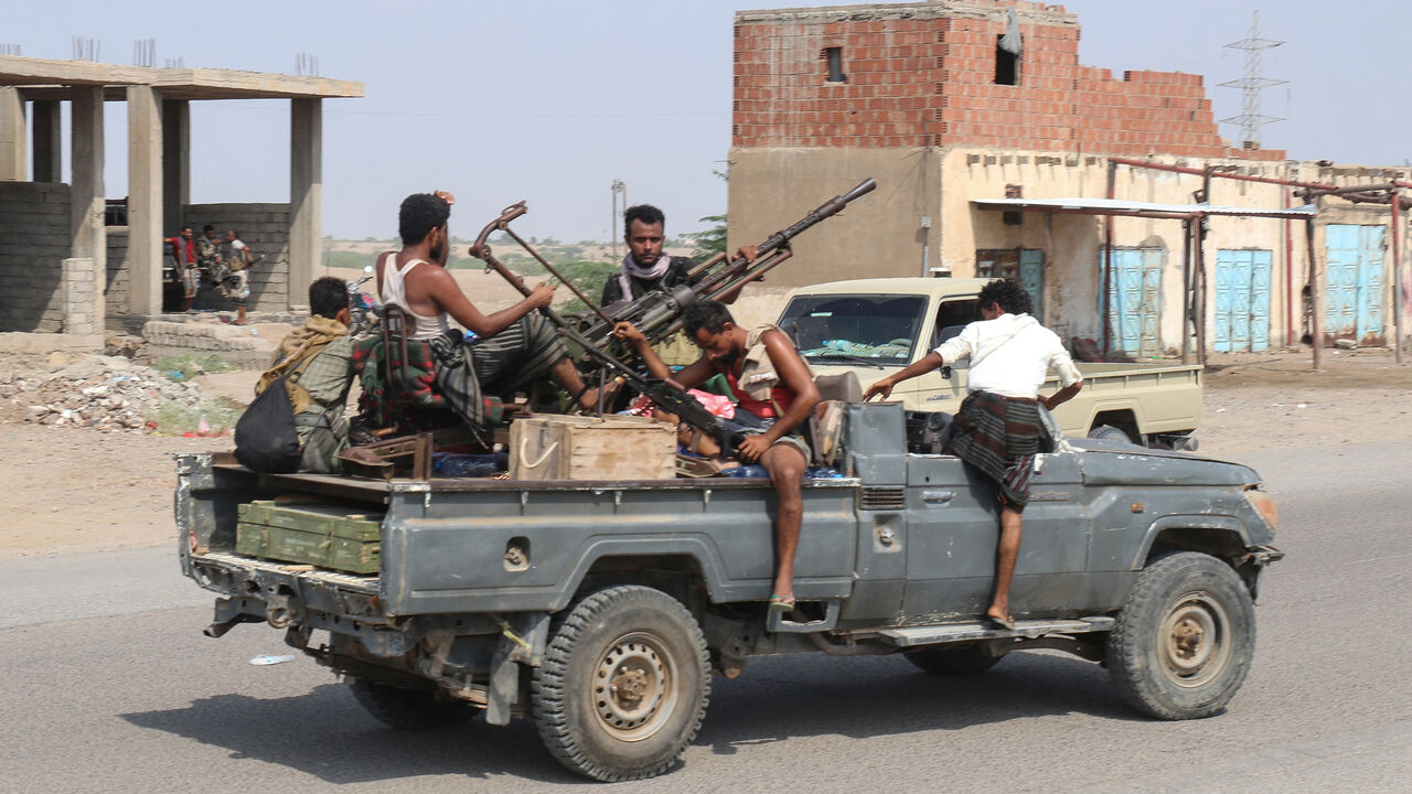 Forces loyal to Yemen's Saudi-backed government ride in a pick-up truck in the Hays district, south of Hodeidah, Yemen, Sept. 5, 2026.