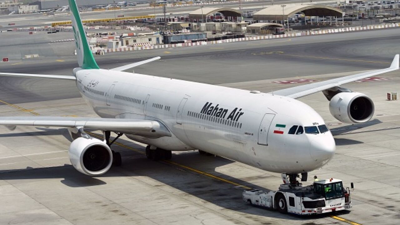 A picture take on September 14, 2017 shows an Airbus A340 of Mahan Air at the tarmac at Dubai's International Airport. (Photo by GIUSEPPE CACACE / AFP) (Photo by GIUSEPPE CACACE/AFP via Getty Images)