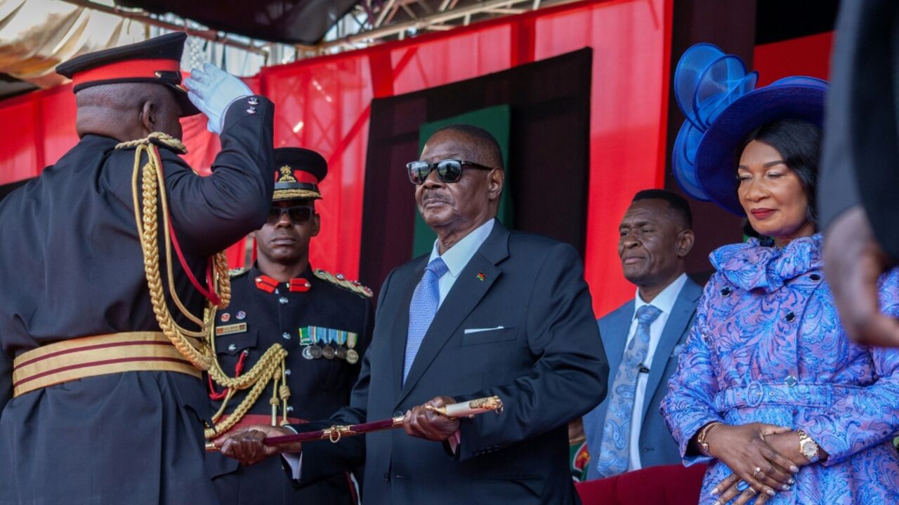 General Paul Valentino Phiri (L) was head of Malawi's armed forces from July 2023 until October 2025