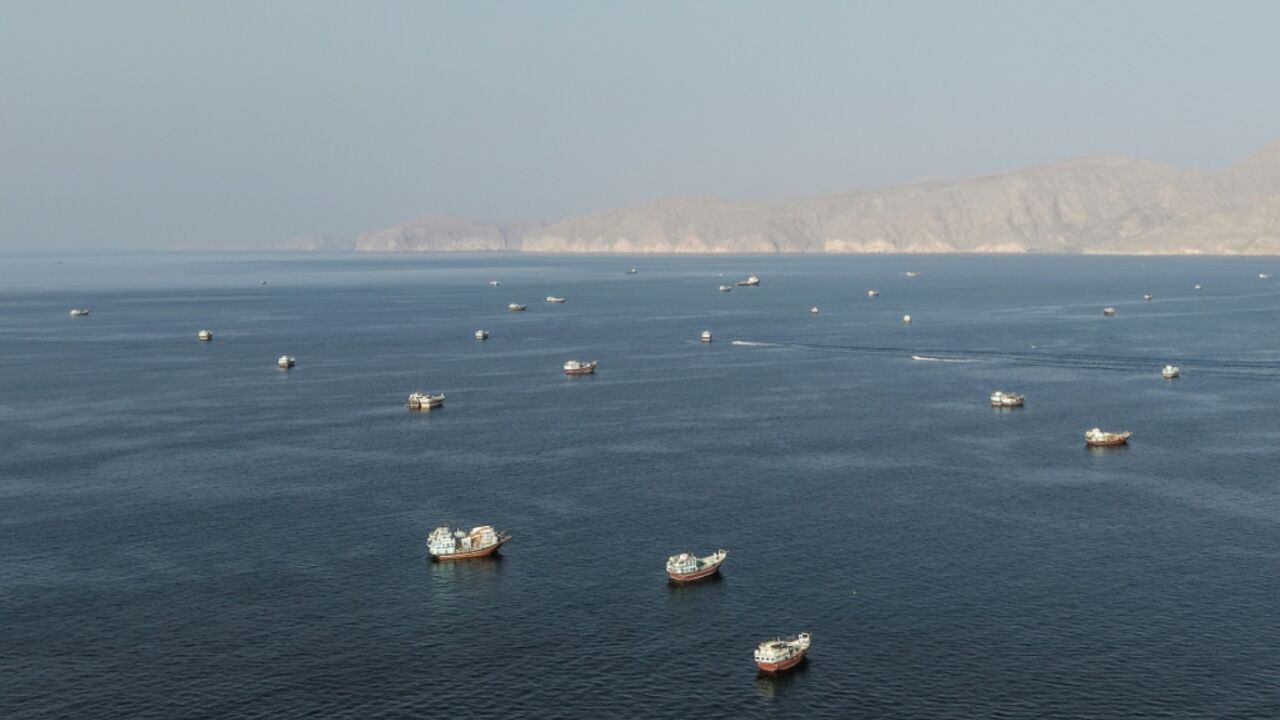 Ships anchored off the coast of Musandam governorate in Oman near the Strait of Hormuz on Friday