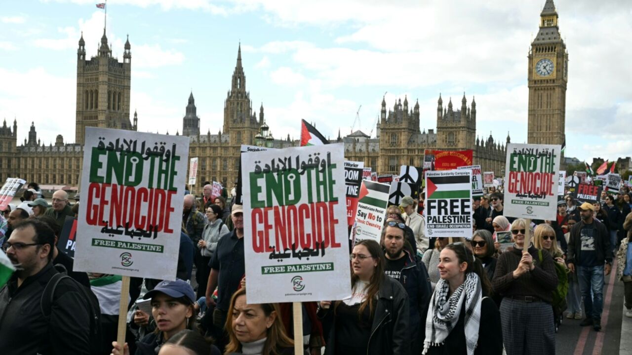 Marchers carried placards reacing 'End the genocide' and 'Free Palestine'