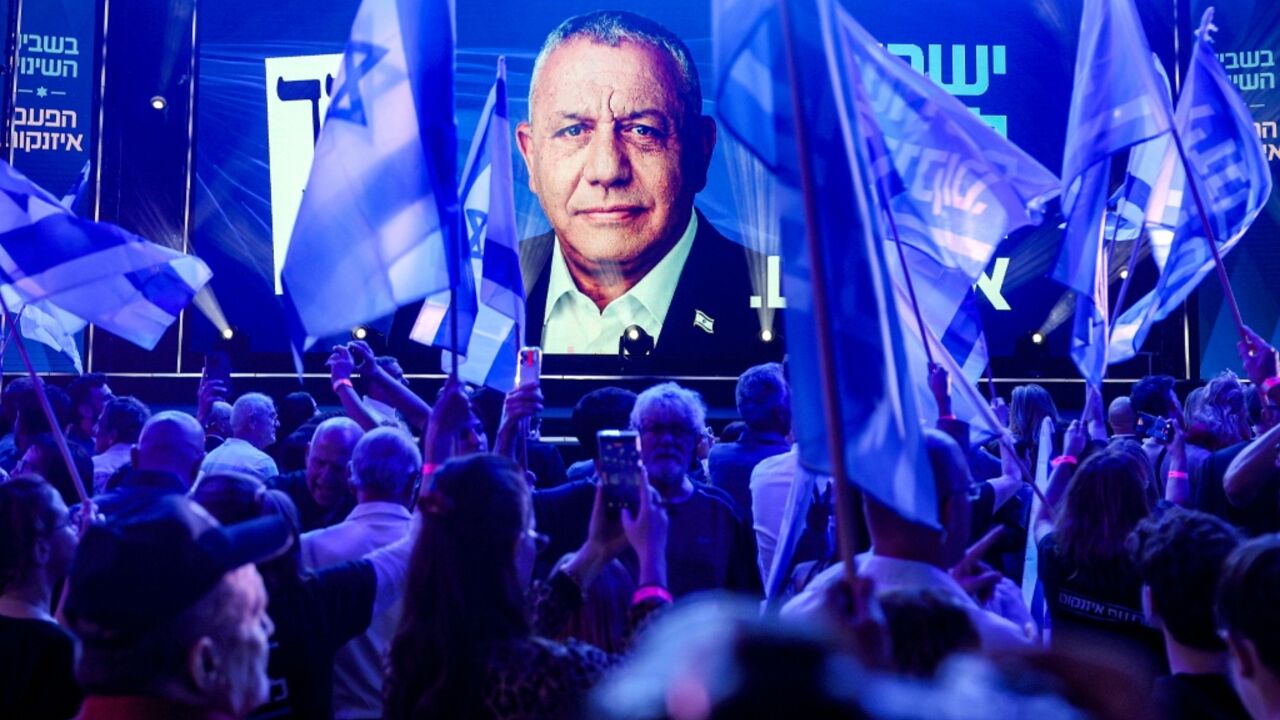 Supporters of the Yashar party led by Gadi Eisenkot, Israel's former military chief of staff, attend the party's final campaign rally before the legislative election, in Tel Aviv