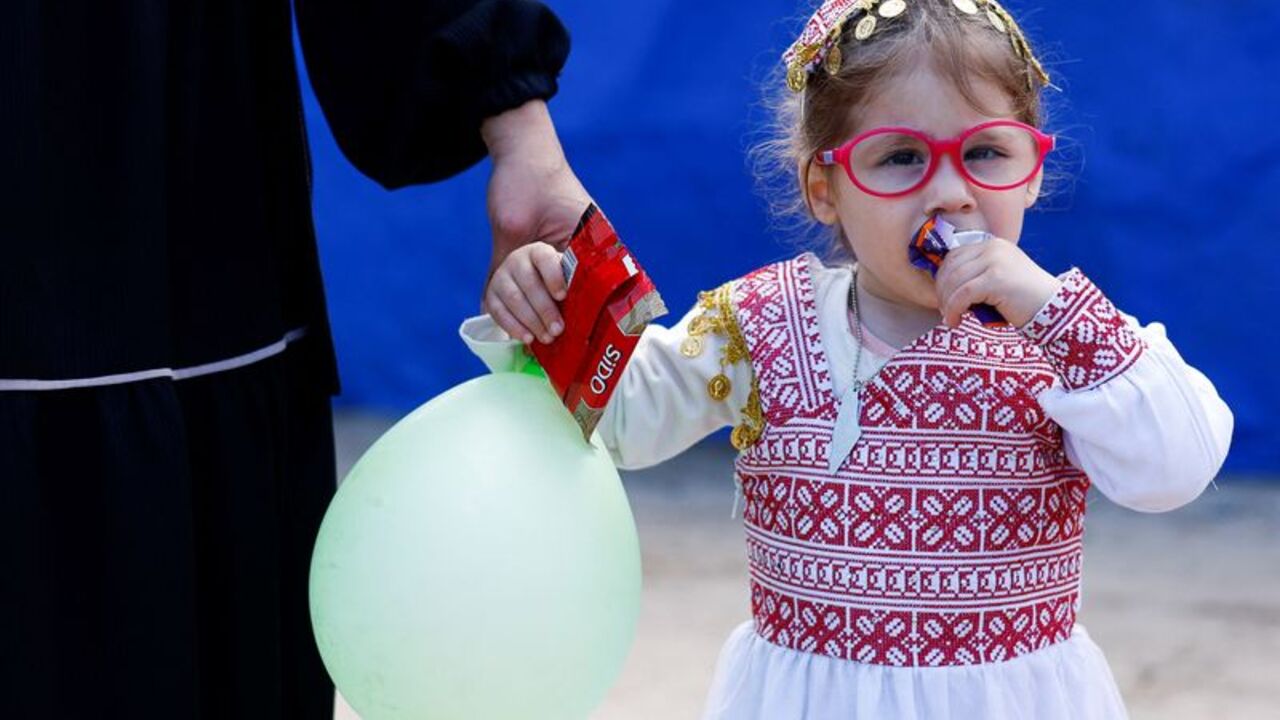 Families reunite with children who were evacuated from Gaza as premature babies, in Gaza Strip