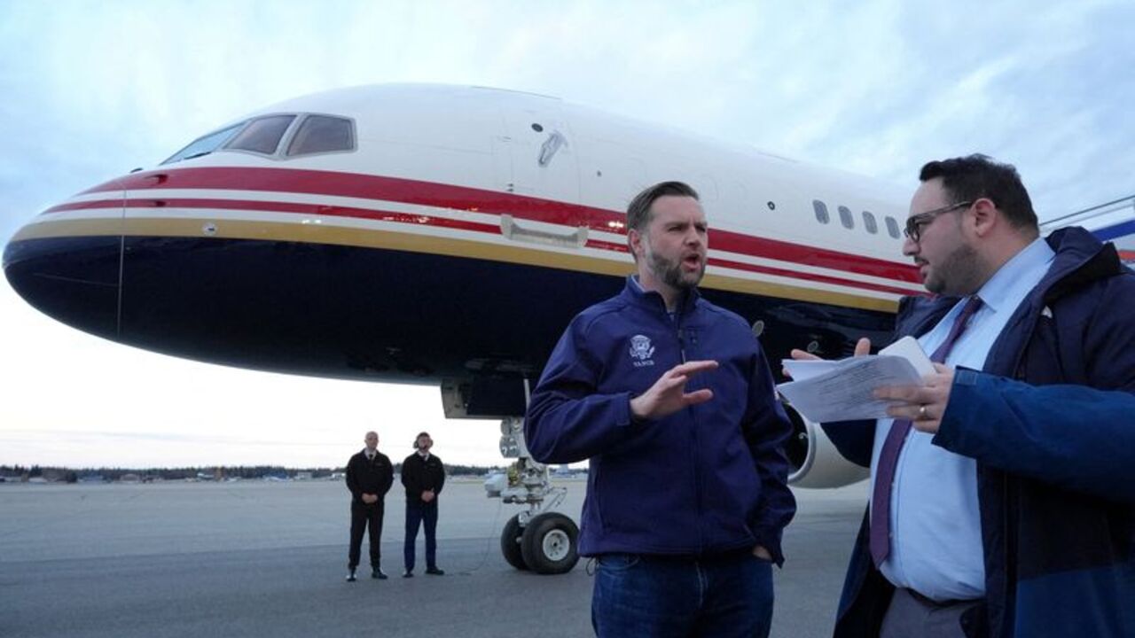 FILE PHOTO: US Vice President JD Vance is interviewed by Reuters reporter Jacob Bogage before a campaign rally at Fairbanks International Airport in Fairbanks