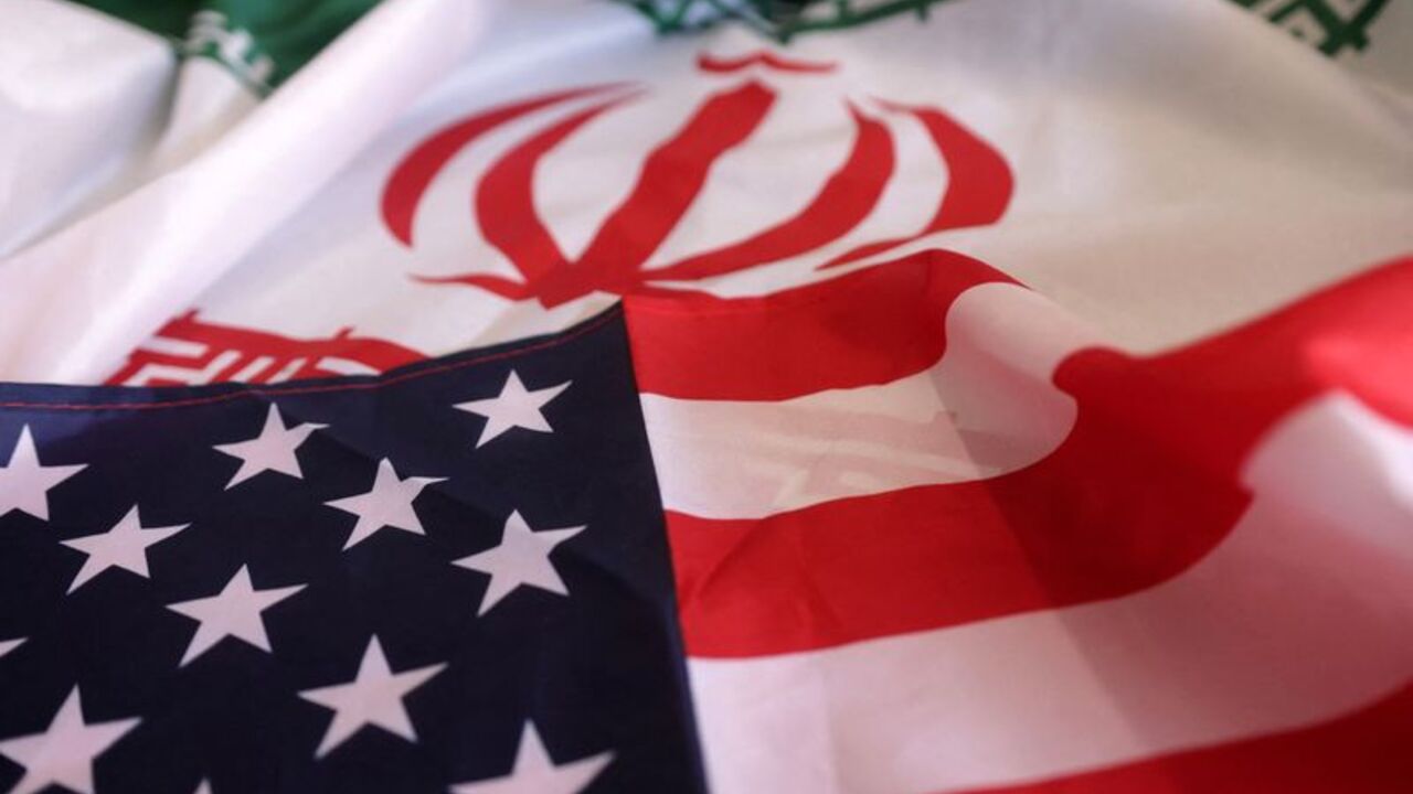 Illustration shows USA and Iranian flags