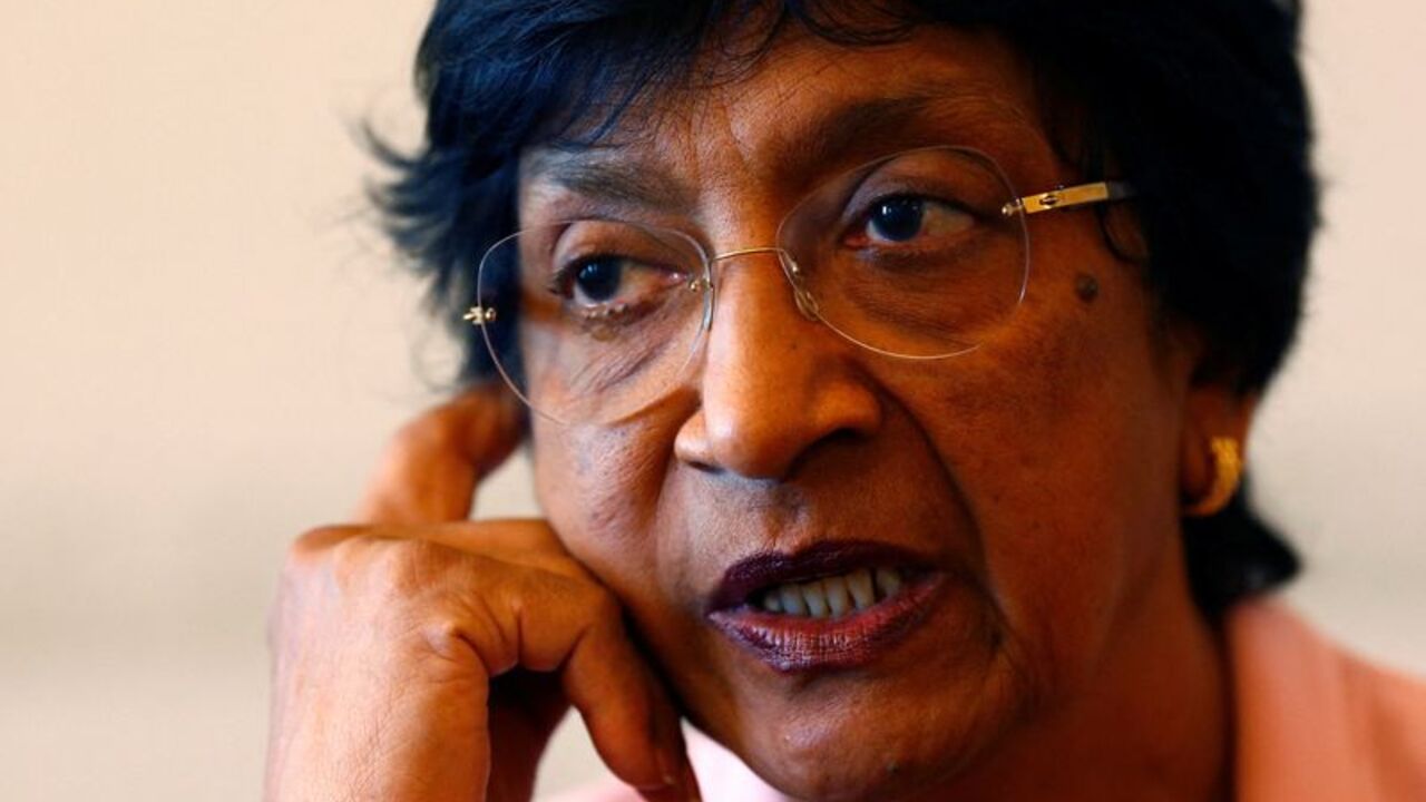 FILE PHOTO: Outgoing U.N. Human Rights Commissioner Navi Pillay talks during an interview to Reuters in her office in Geneva