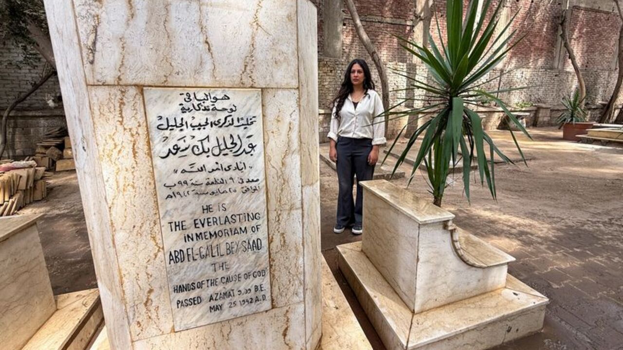 Egyptian Baha'i architect Joumana Labib enters a cemetery dedicated to members of the Baha'i community in the Al-Basateen district of Cairo