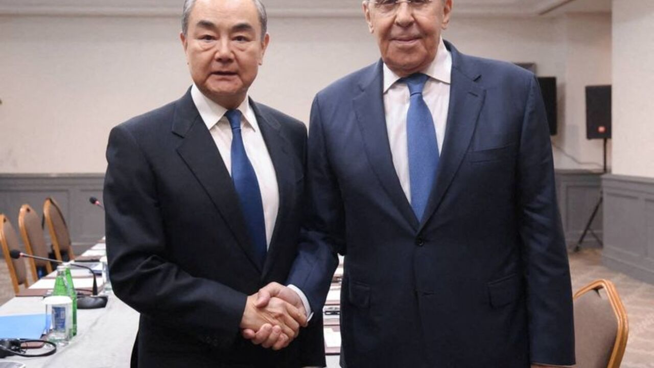 Russia's Foreign Minister Sergei Lavrov and China's Foreign Minister Wang Yi meet in Baku
