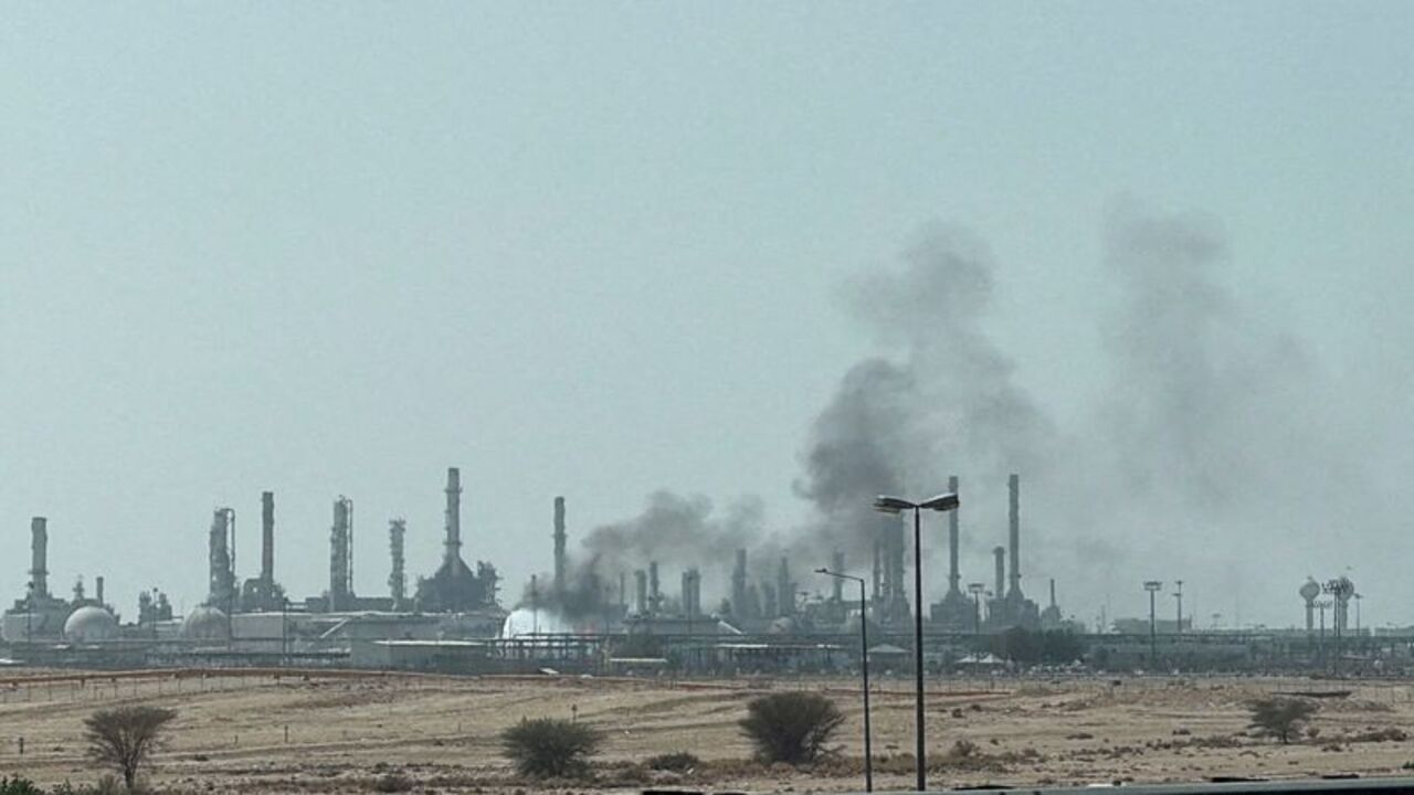 FILE PHOTO: Smoke rises from a fire at the Aramco refinery south of Riyadh