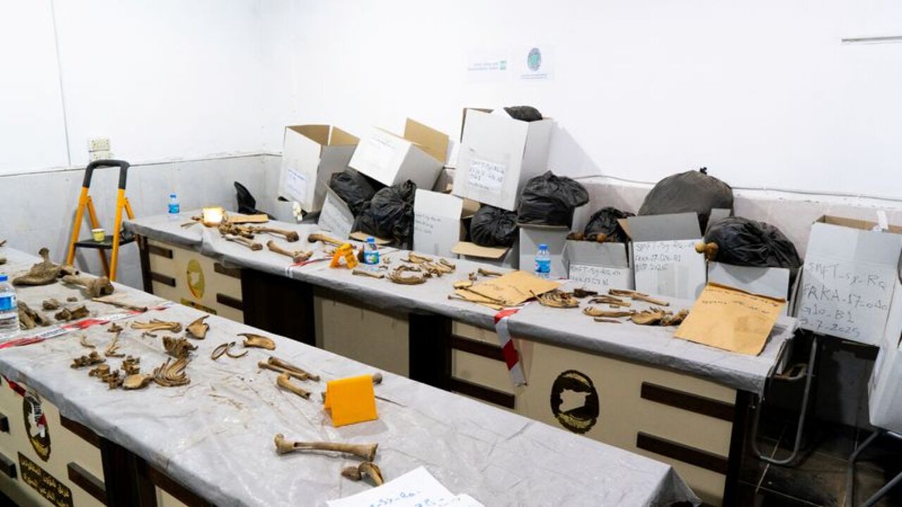 Human remains and labelled storage boxes are seen at the Raqqa Lab in Raqqa
