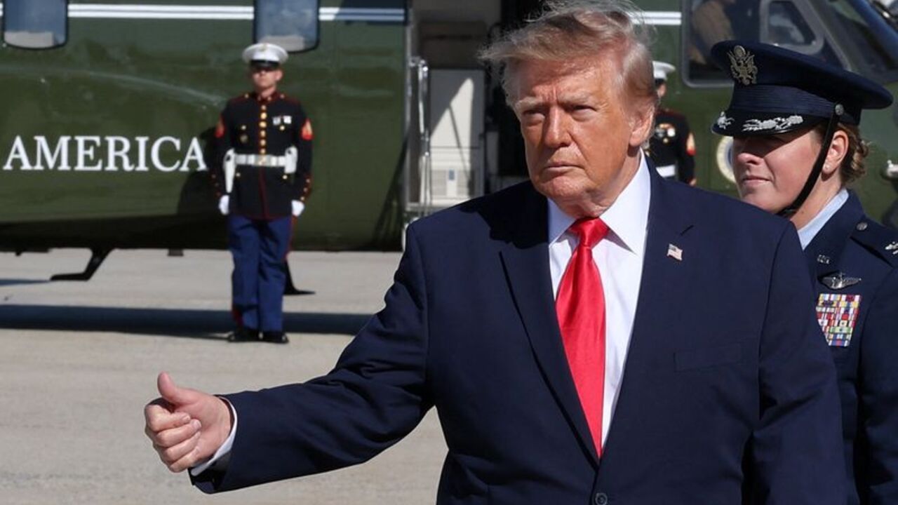 US President Donald Trump boards Air Force One at JBA en route to Fort Myers