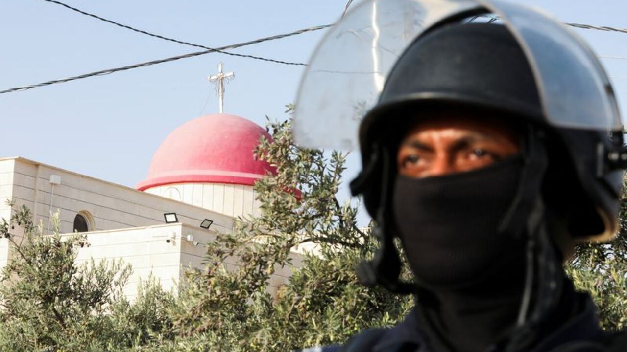 The grounds of Saint George’s Greek Orthodox Church, where gunmen opened fire during a funeral the previous day, in the village of Hamoud