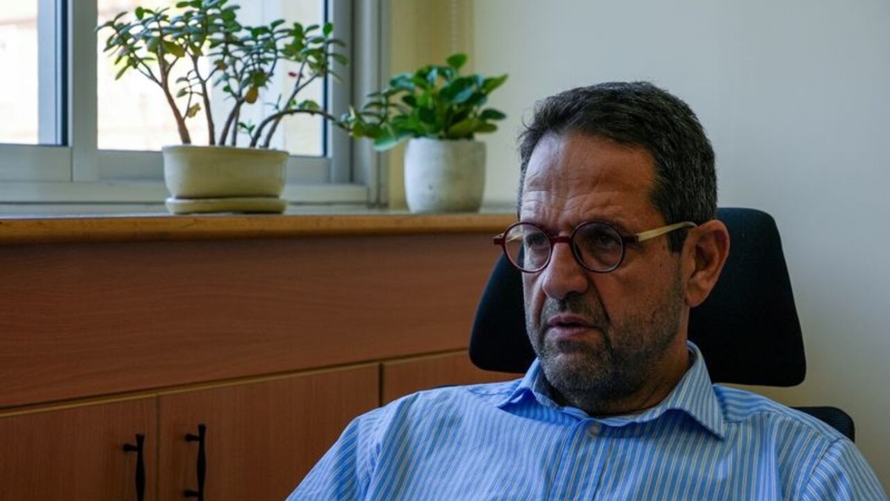 Sami Nader, economist at the Saint Joseph University of Beirut, attends an interview with Reuters in Beirut