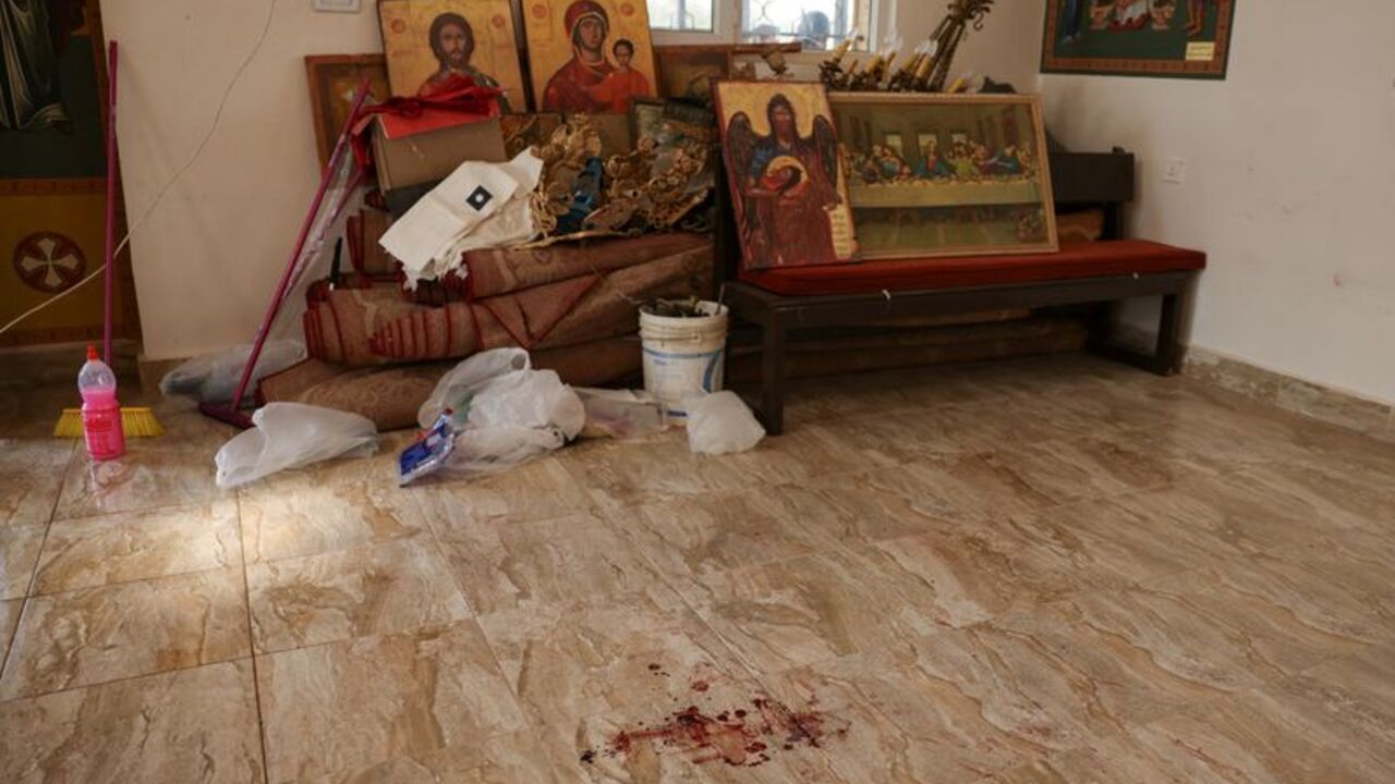 The grounds of Saint George’s Greek Orthodox Church, where gunmen opened fire during a funeral the previous day, in the village of Hamoud