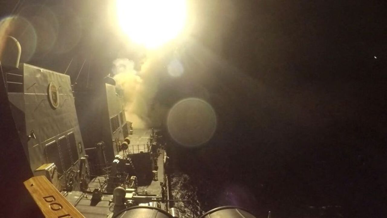 USS Michael Murphy (DDG 112) launches Tomahawk cruise missiles from an unknown location