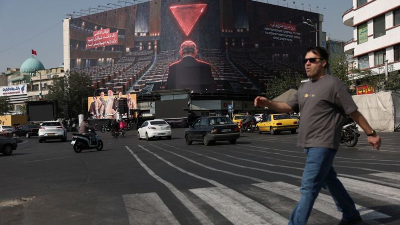 A billboard depicting Israeli Prime Minister Benjamin Netanyahu in the empty hall of the United Nations, on a building in Tehran
