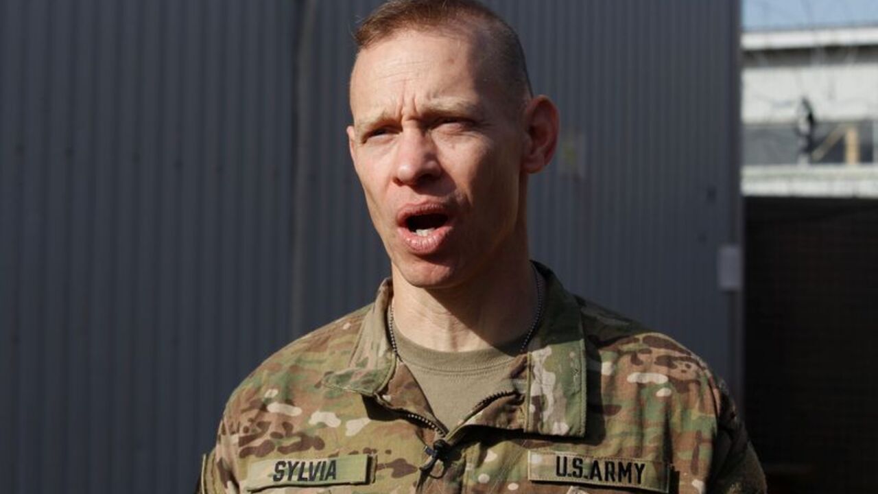 U.S. Army Colonel Brett G. Sylvia speaks during an interview in Makhmour