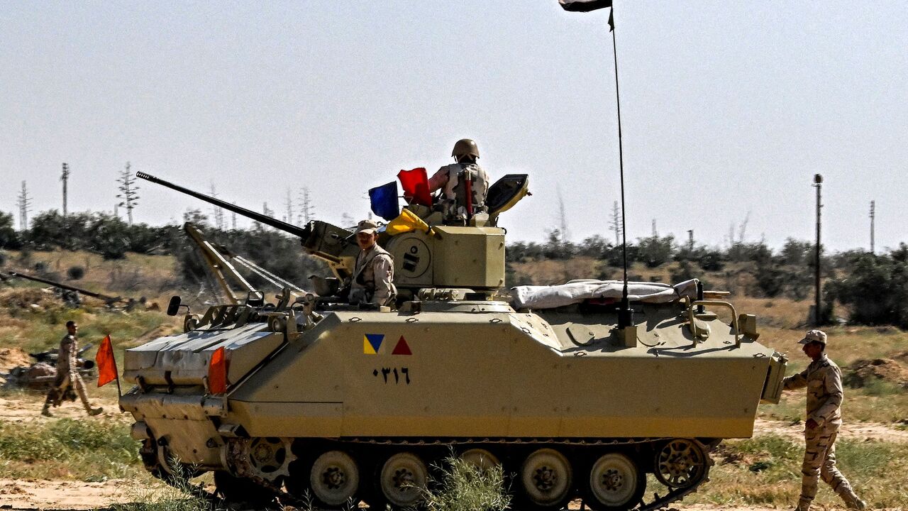 Egyptian soldiers man an infantry fighting vehicle