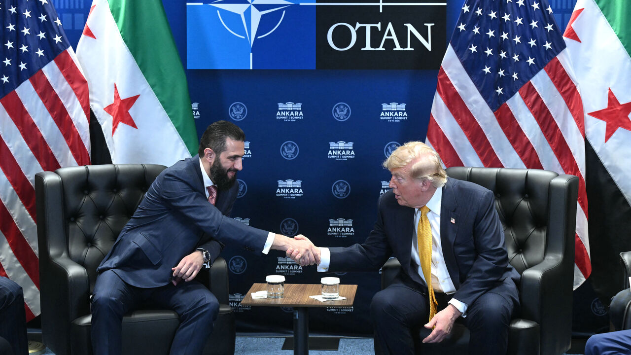 US President Donald Trump meets Syrian President Ahmed al-Sharaa (L) on the sidelines of the NATO Summit at Bestepe Presidential Compound in Ankara, on July 8, 2026. 