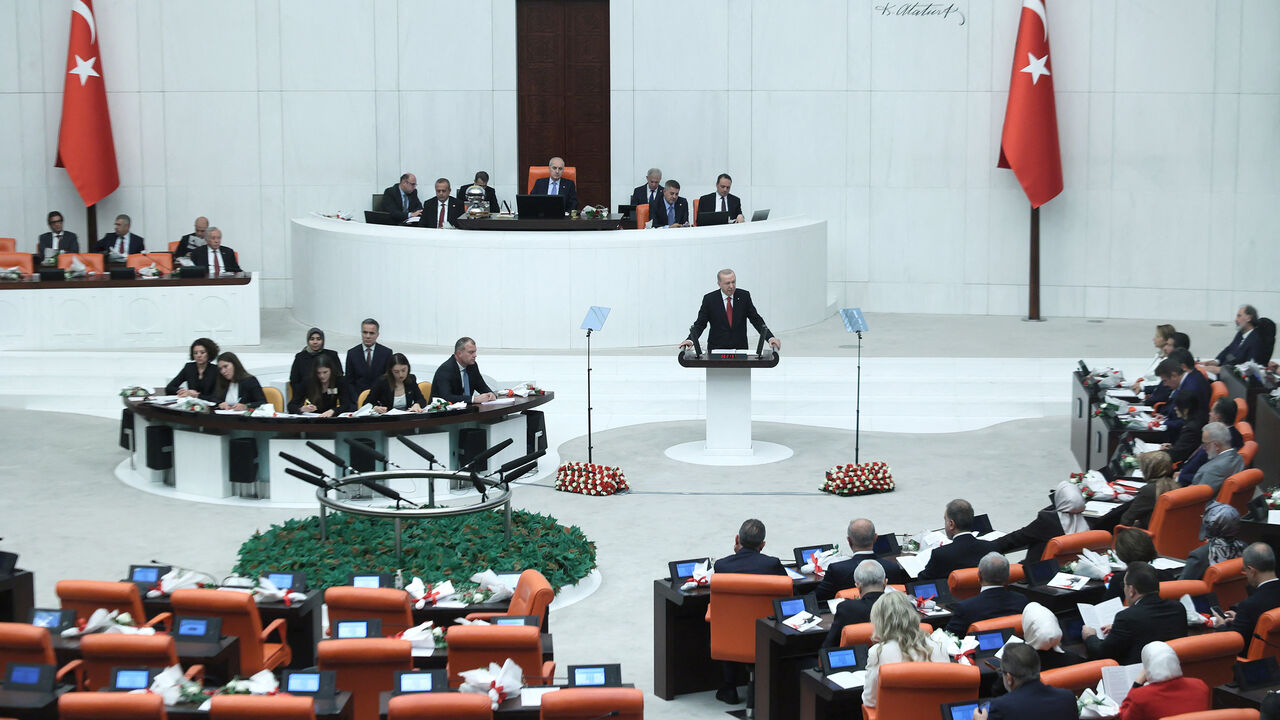 Turkish President Recep Tayyip Erdogan addresses Turkish members of parliament during the opening of the parliamentary session at the Grand National Assembly of Turkey, Ankara, Turkey, Oct. 1, 2026.